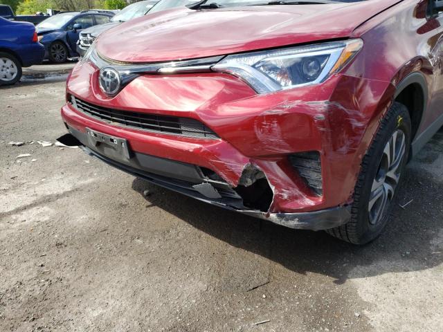 Photo 9 from auction – 2018 TOYOTA RAV4 LE with VIN JTMBFREV4JD225676