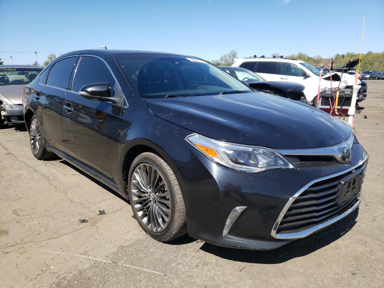 TOYOTA AVALON XLE 2016 with VIN 4T1BK1EB7GU213285 - Photo from auction