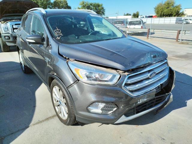 FORD ESCAPE TIT 2017 with VIN 1FMCU0J93HUC14009 - Photo from auction