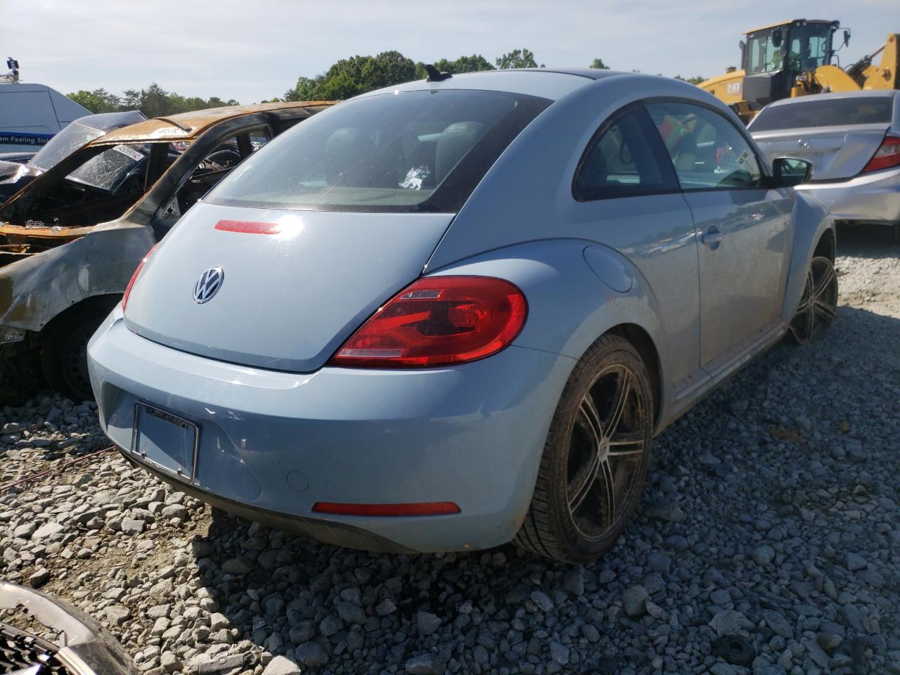 Photo 14 from auction – 2013 VOLKSWAGEN BEETLE with VIN 3VWJX7AT5DM660486