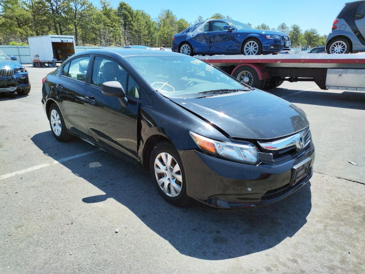 HONDA CIVIC LX 2012 with VIN 19XFB2F58CE374385 - Photo from auction