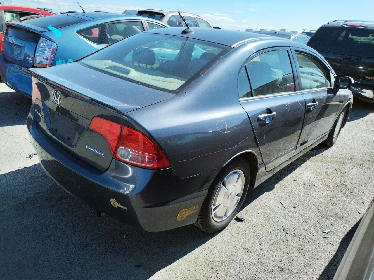 Photo 4 from auction – 2007 HONDA CIVIC HYBR with VIN JHMFA36267S003578