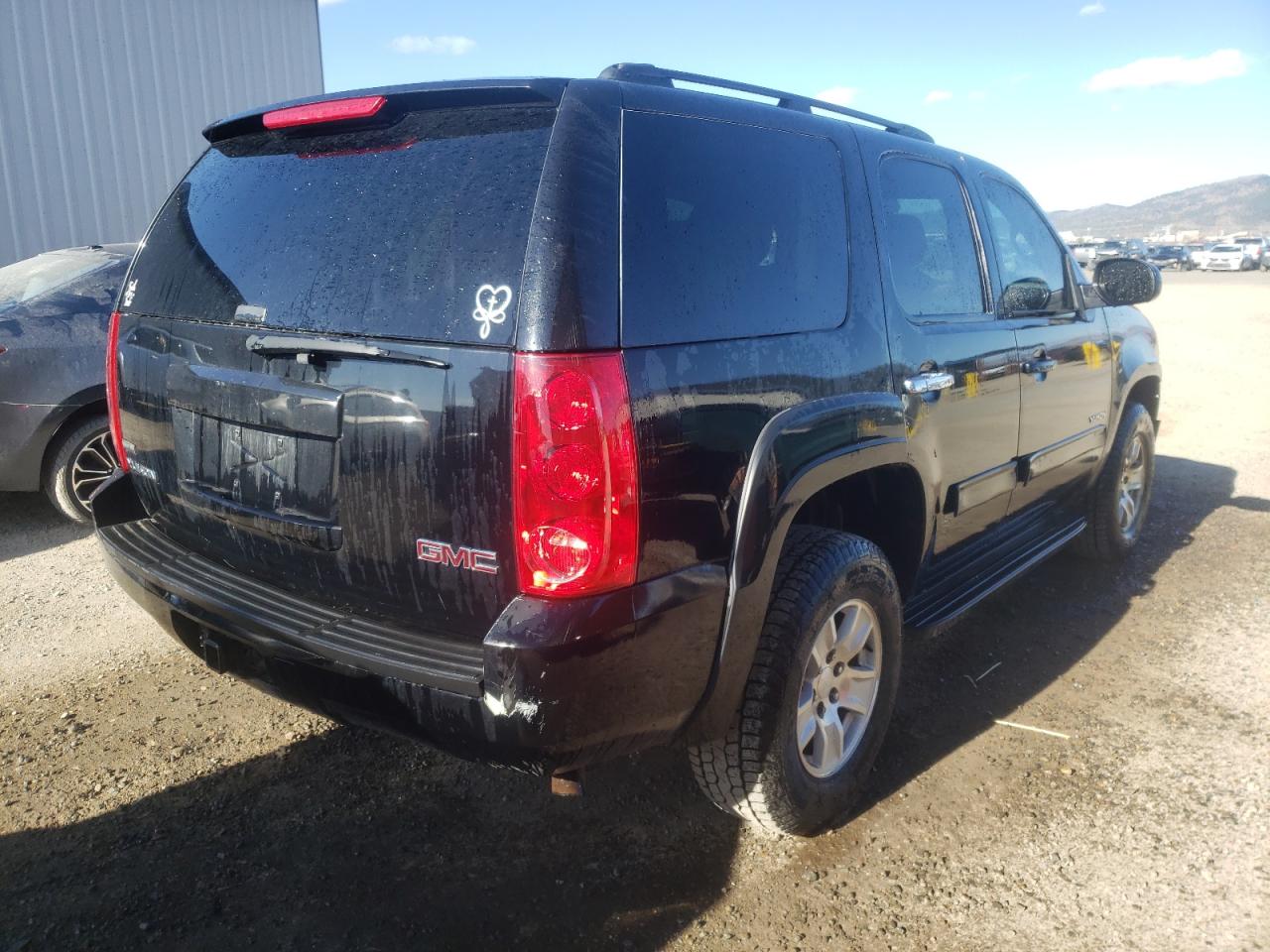 Photo 4 from auction – 2011 GMC YUKON SLE with VIN 1GKS2AE06BR114749
