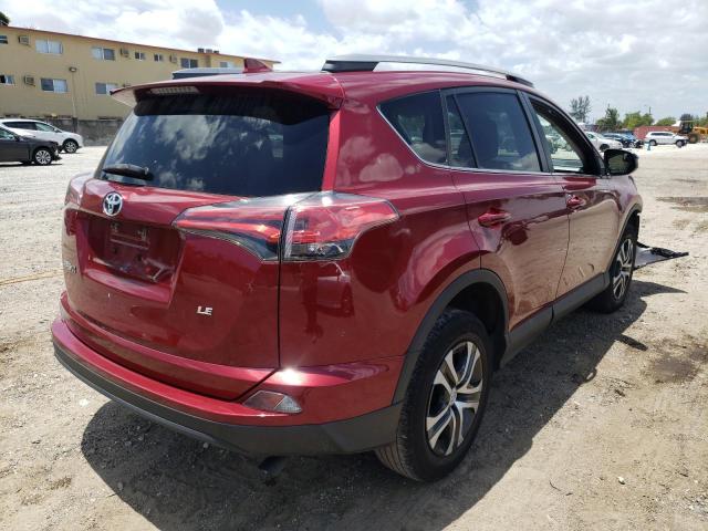 Photo 4 from auction – 2018 TOYOTA RAV4 LE with VIN 2T3ZFREV7JW460719