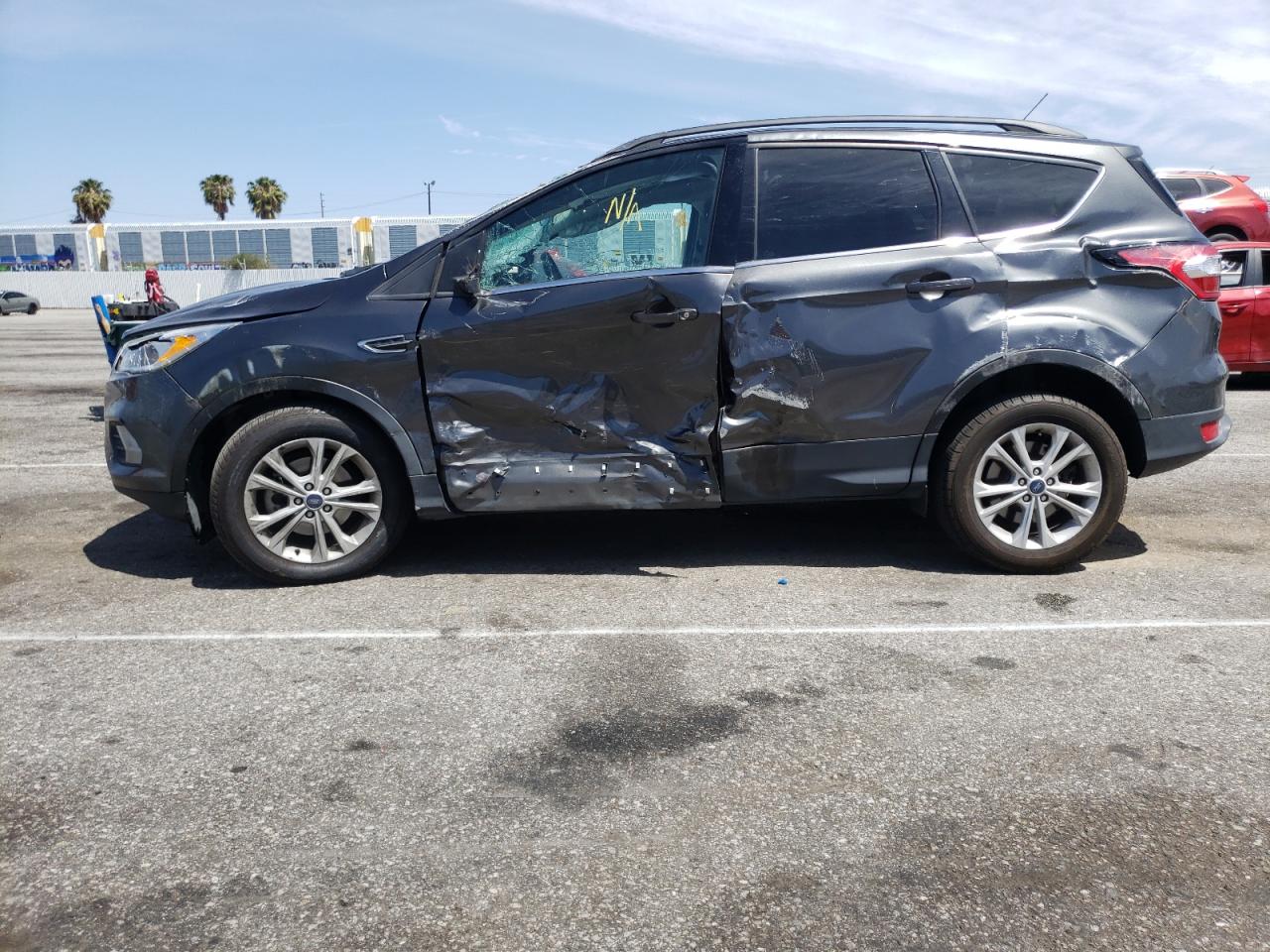 Photo 9 from auction – 2018 FORD ESCAPE SE with VIN 1FMCU0GD2JUC90824