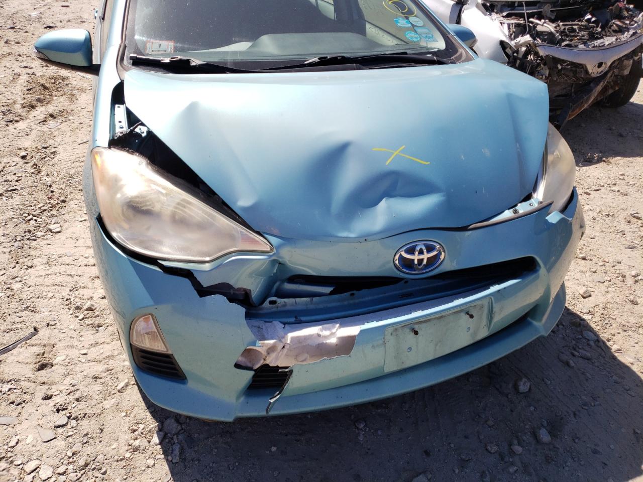 Photo 9 from auction – 2012 TOYOTA PRIUS C with VIN JTDKDTB32C1011778