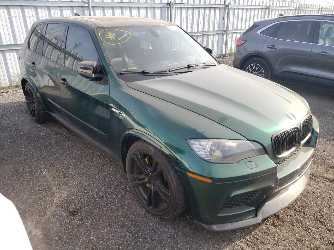 BMW X5 M 2010 with VIN 5YMGY0C53ALK25745 - Photo from auction