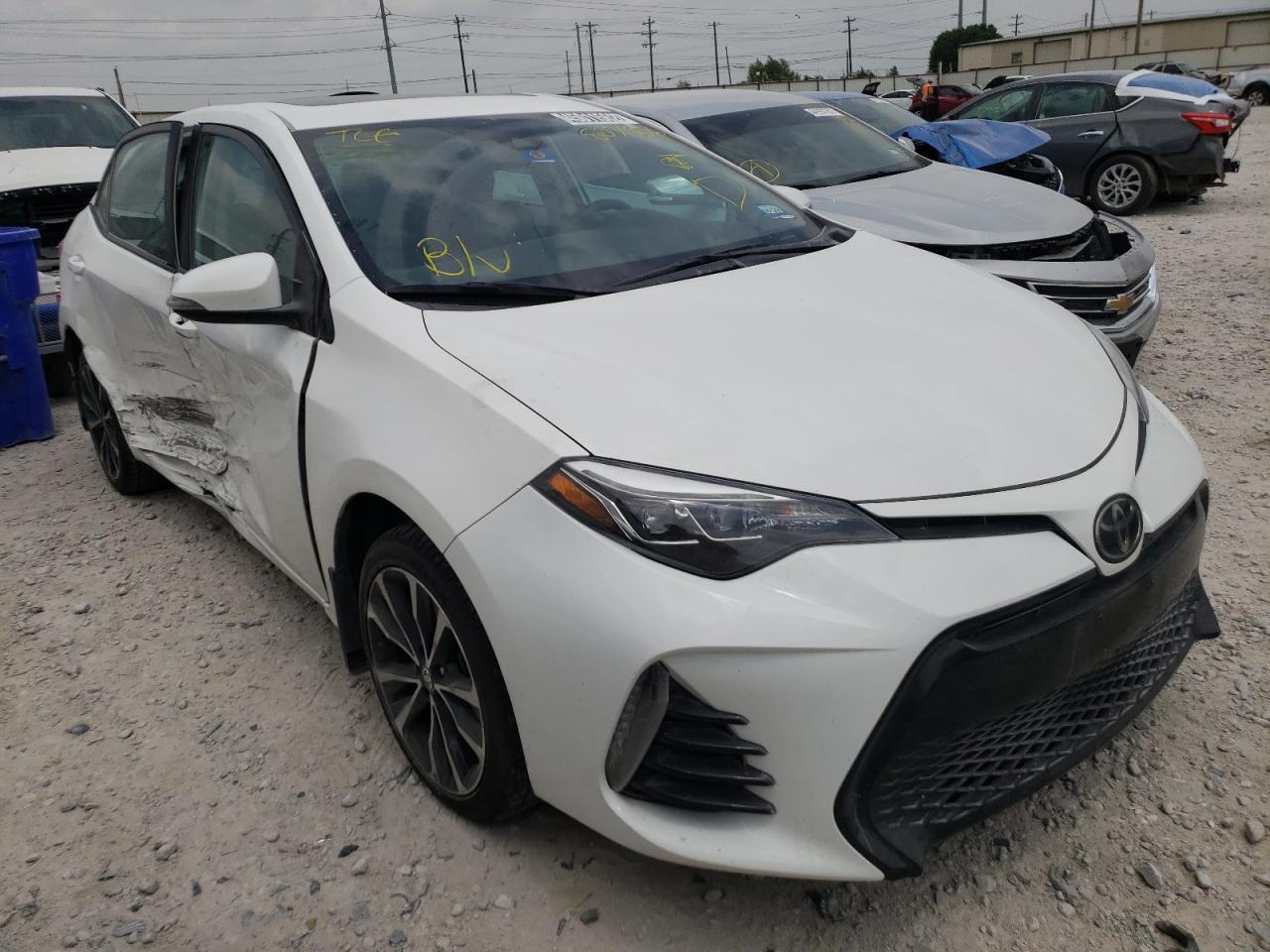 TOYOTA COROLLA L 2018 with VIN 5YFBURHE4JP807906 - Photo from auction