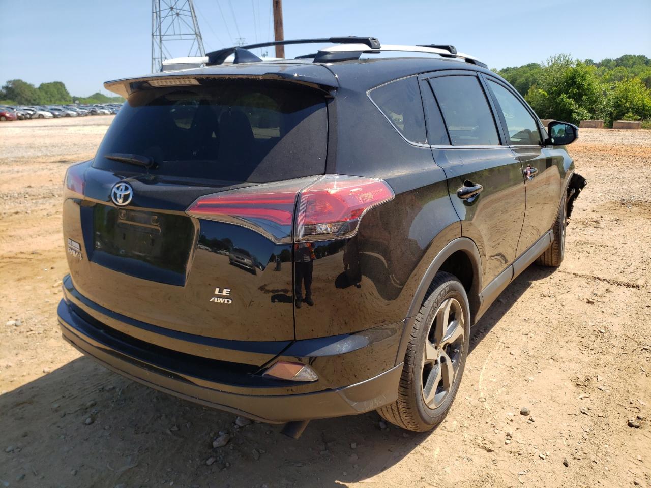 Photo 4 from auction – 2017 TOYOTA RAV4 LE with VIN 2T3BFREV2HW611865