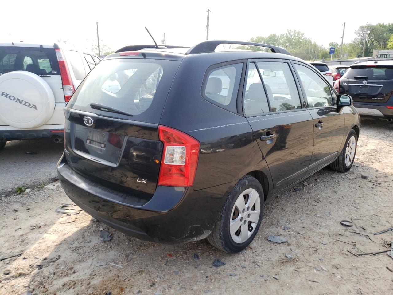 Photo 4 from auction – 2009 KIA RONDO BASE with VIN KNAFG528497237534