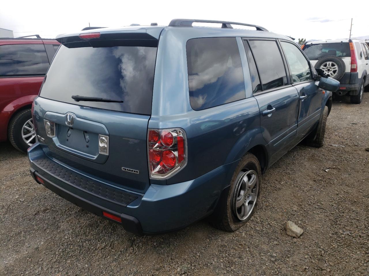 Photo 17 from auction – 2006 HONDA PILOT EX with VIN 2HKYF18526H553803