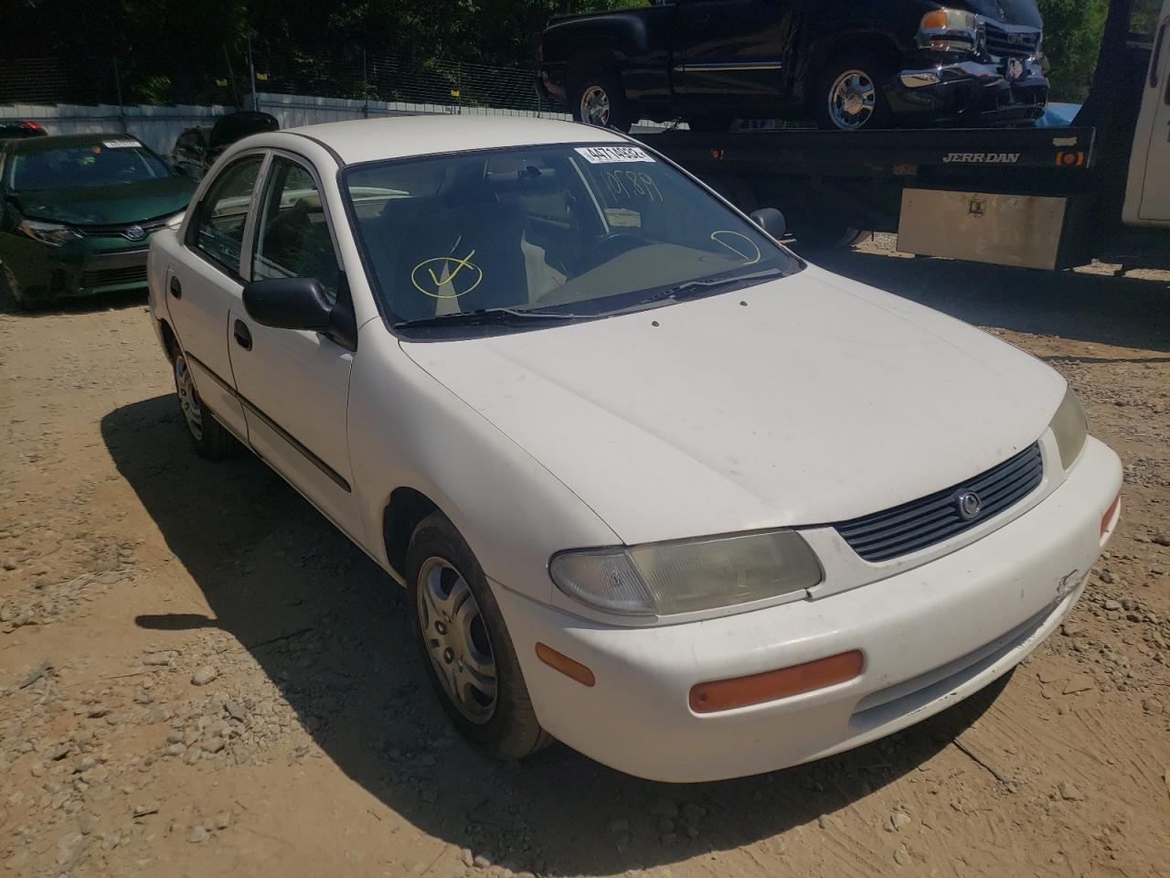 MAZDA PROTEGE DX 1995 with VIN JM1BA1410S0168707 - Photo from auction
