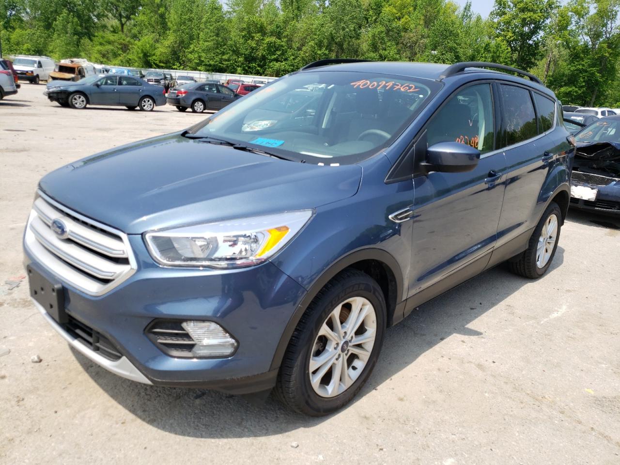 Photo 2 from auction – 2018 FORD ESCAPE SE with VIN 1FMCU9GD0JUC24244