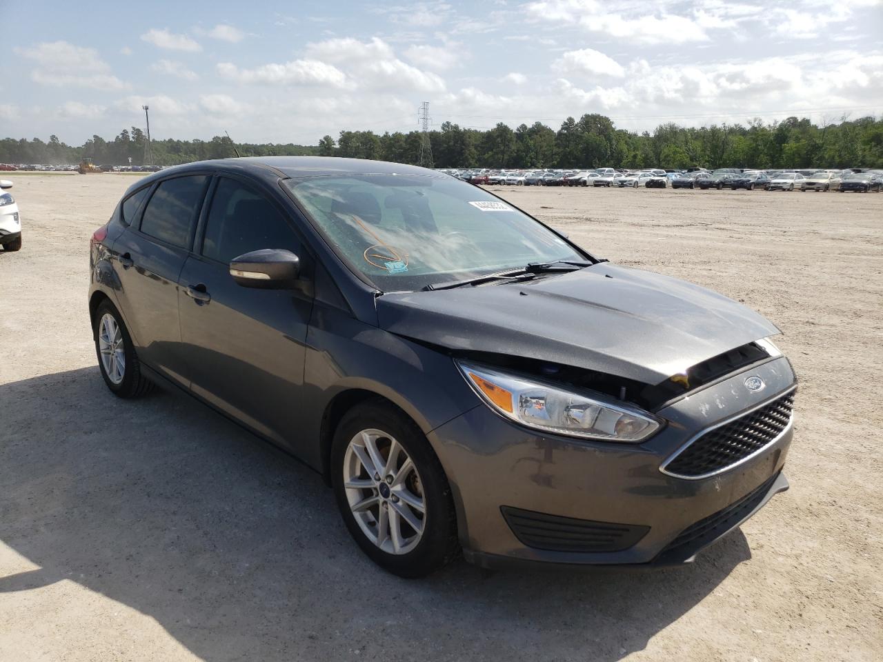 FORD FOCUS SE 2016 with VIN 1FADP3K20GL379304 - Photo from auction