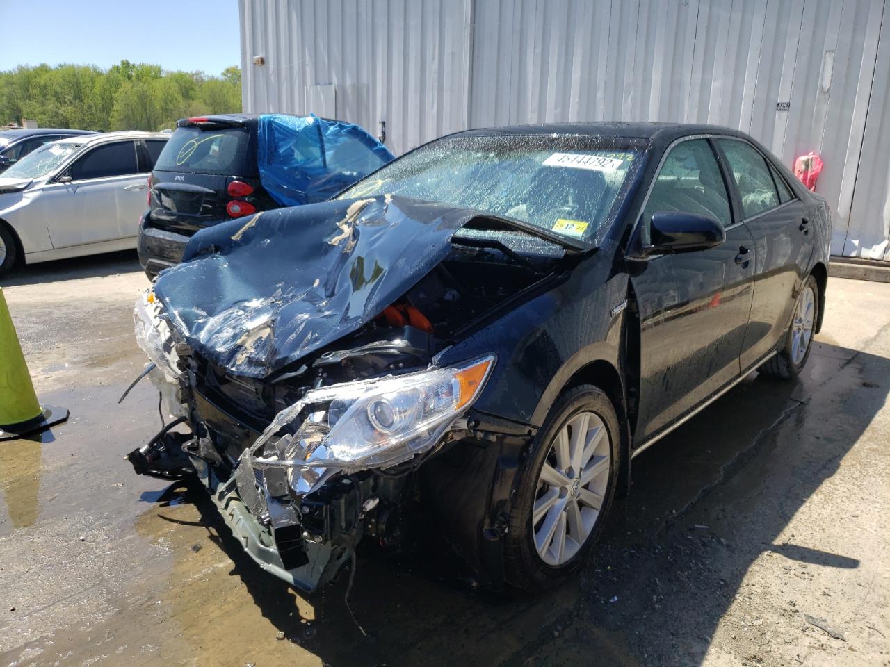 Photo 2 from auction – 2012 TOYOTA CAMRY HYBR with VIN 4T1BD1FK6CU063446
