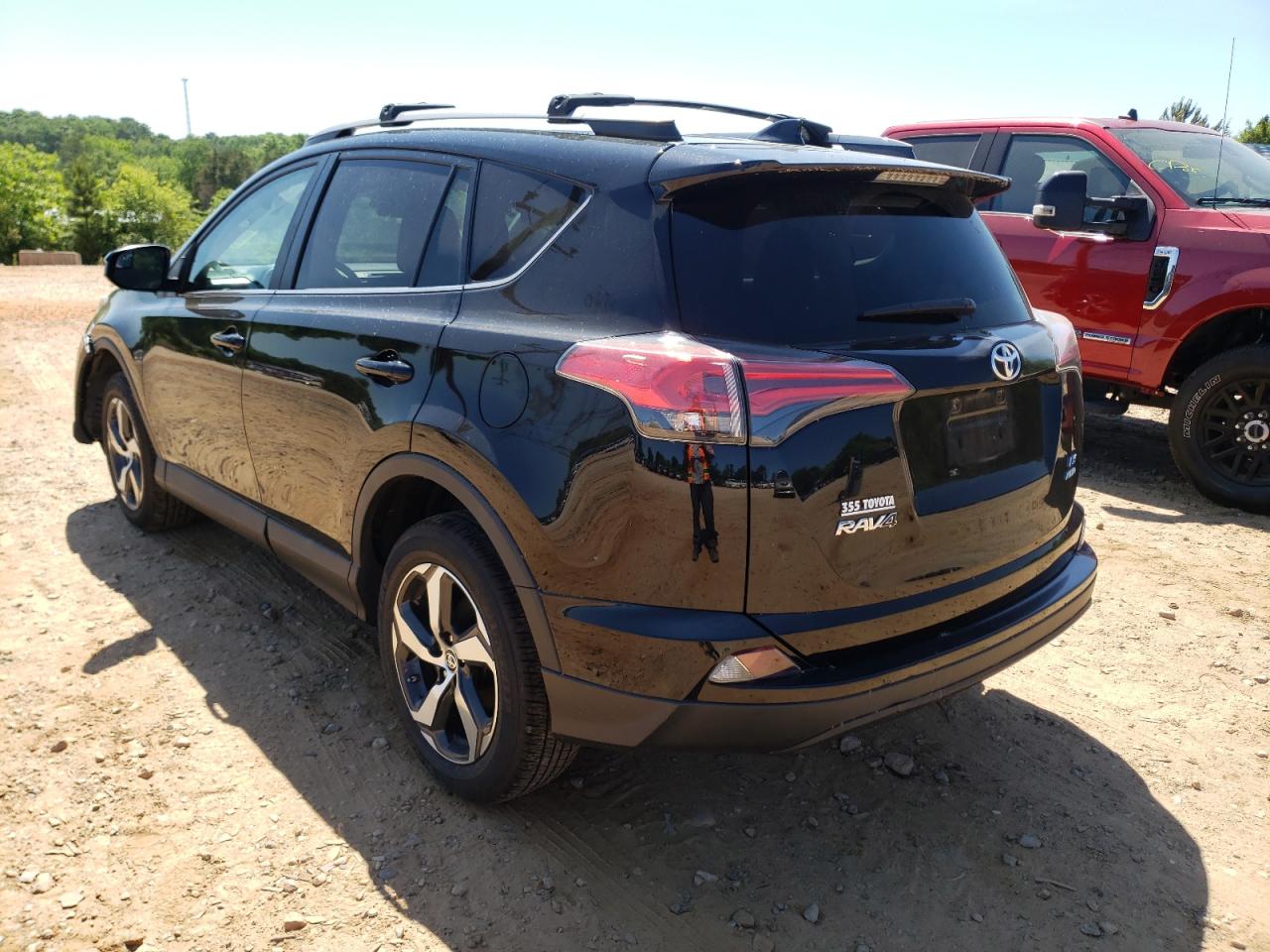 Photo 3 from auction – 2017 TOYOTA RAV4 LE with VIN 2T3BFREV2HW611865