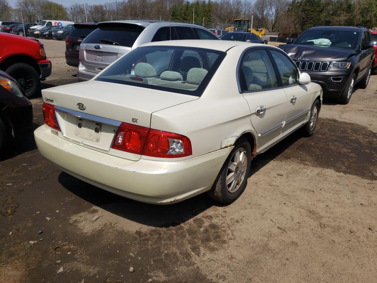 Photo 17 from auction – 2006 KIA OPTIMA LX with VIN KNAGD126465450012