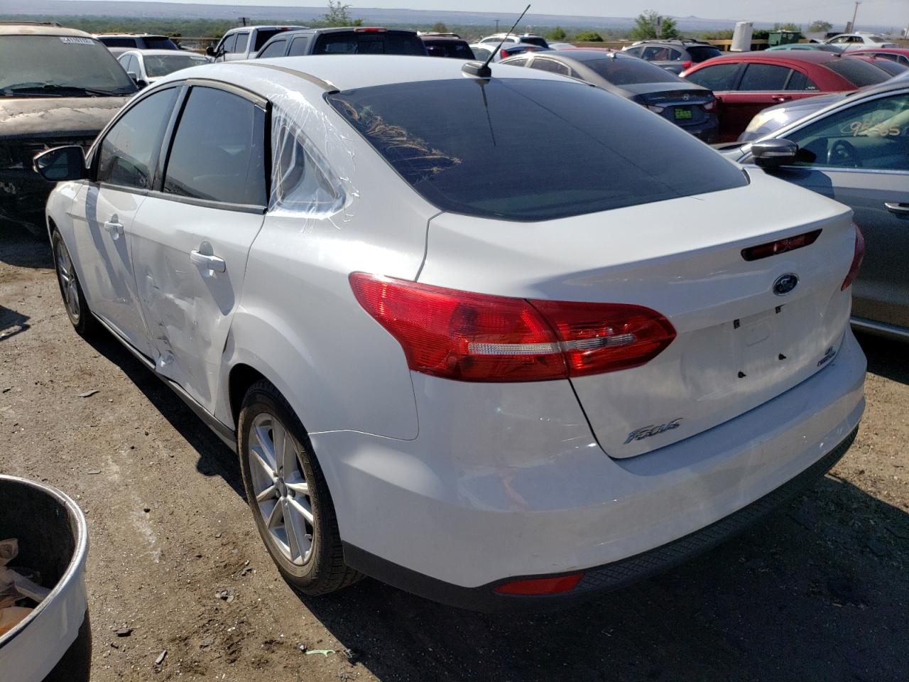 Photo 3 from auction – 2015 FORD FOCUS SE with VIN 1FADP3F27FL255779