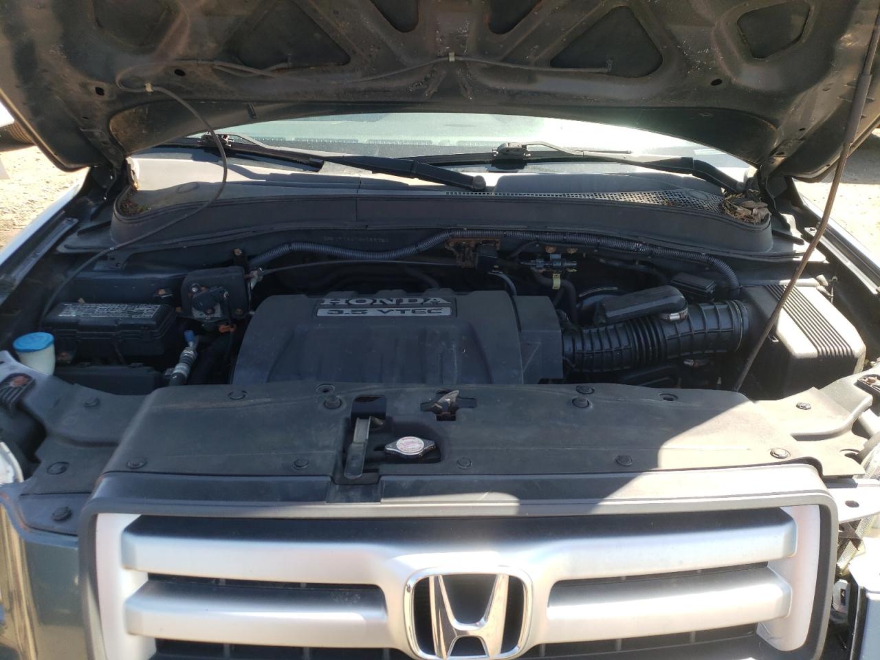 Photo 7 from auction – 2006 HONDA PILOT EX with VIN 2HKYF18476H552766