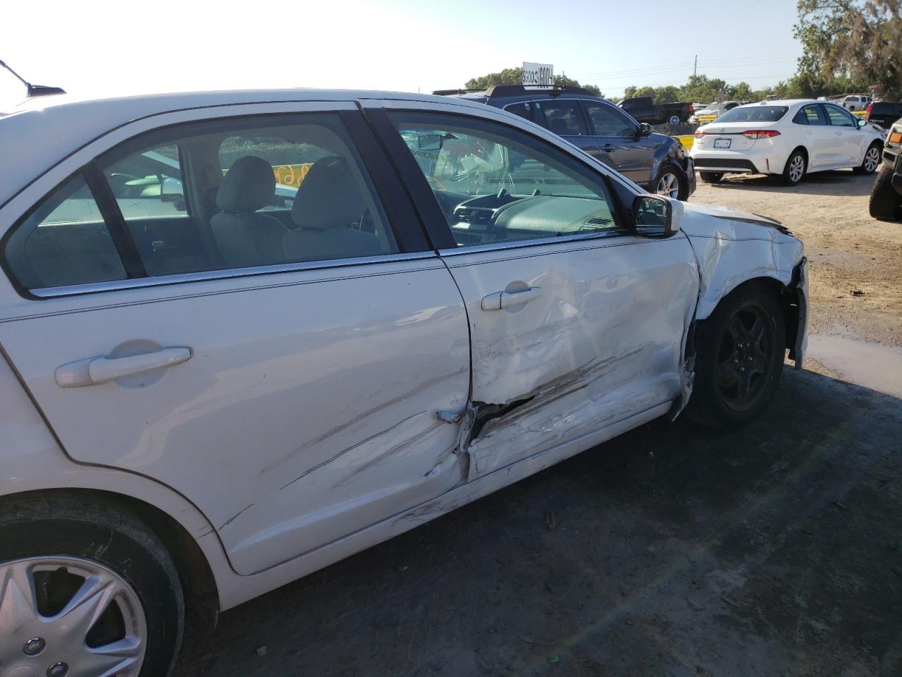 Photo 9 from auction – 2011 FORD FUSION SE with VIN 3FAHP0HA5BR143112
