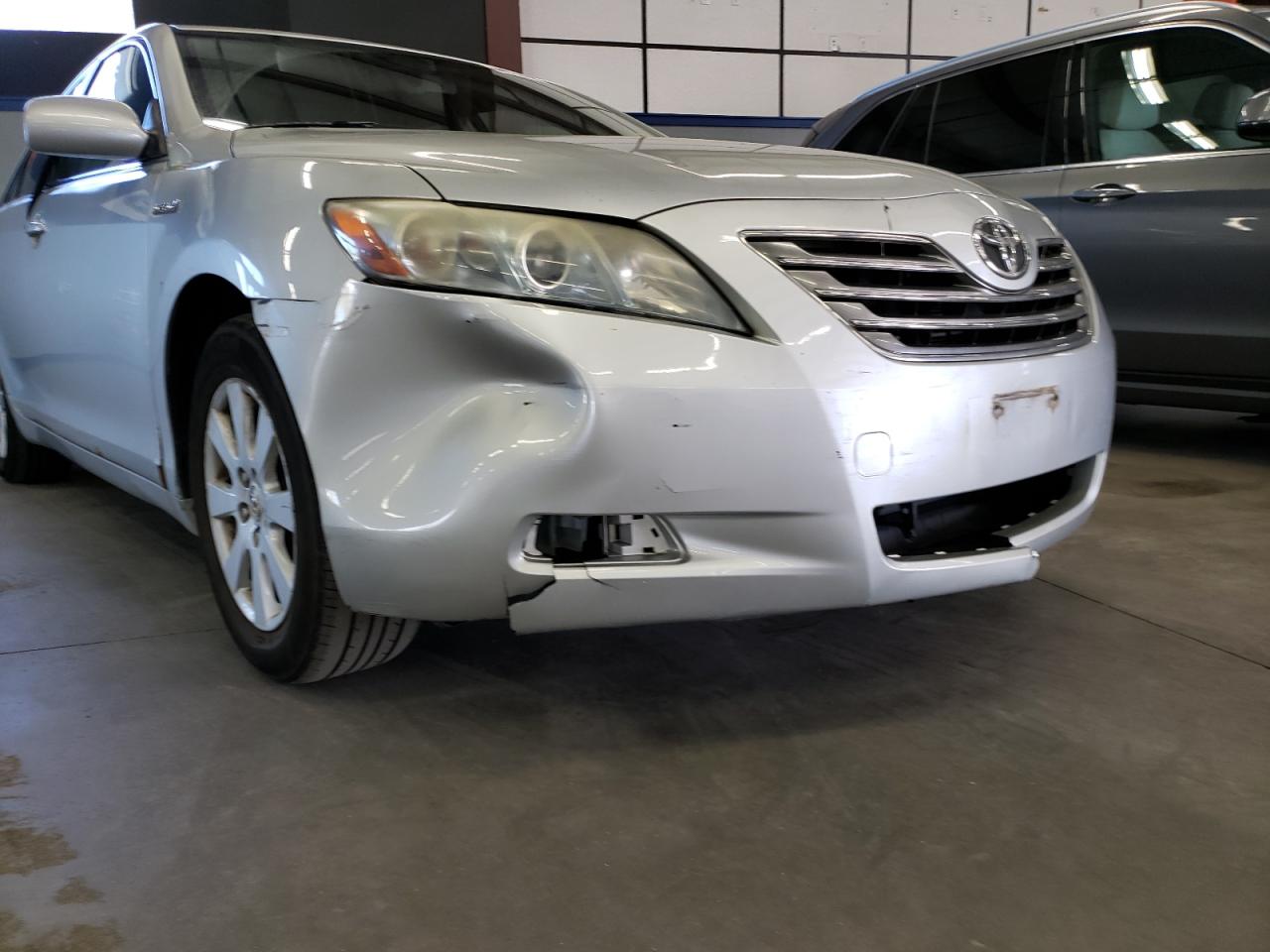 Photo 9 from auction – 2007 TOYOTA CAMRY HYBR with VIN JTNBB46K973018097
