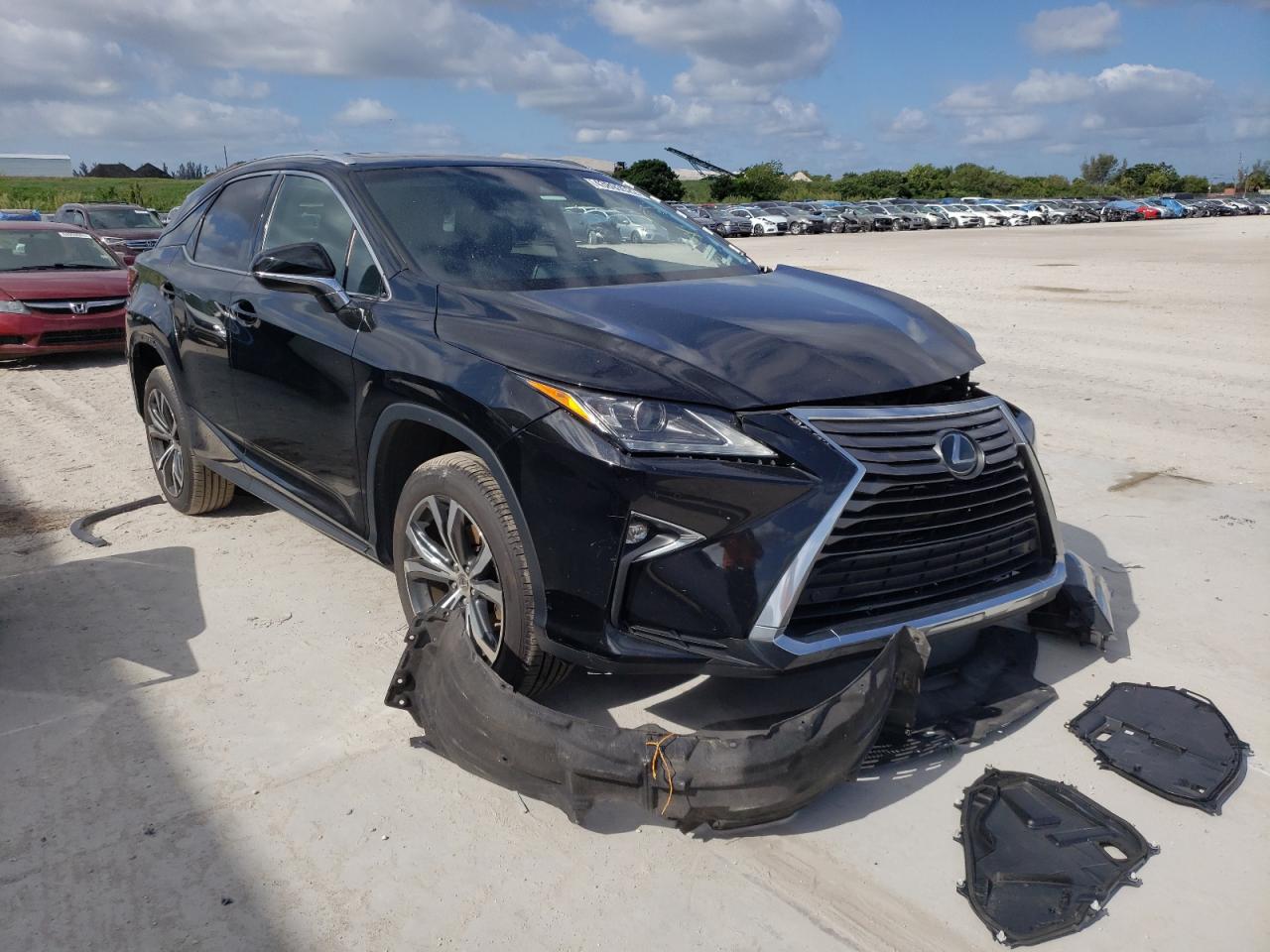 LEXUS RX 350 2016 with VIN 2T2ZZMCA3GC024359 - Photo from auction