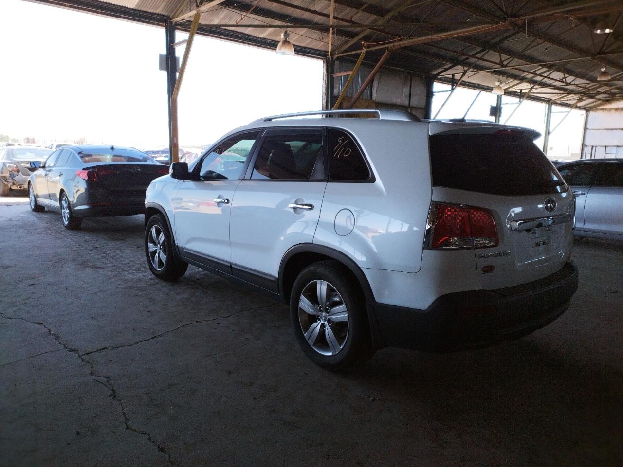 Photo 3 from auction – 2012 KIA SORENTO EX with VIN 5XYKU4A68CG299145