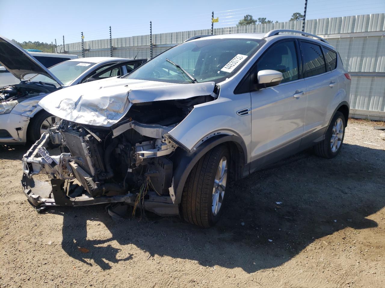 Photo 2 from auction – 2014 FORD ESCAPE TIT with VIN 1FMCU0JX2EUB17619