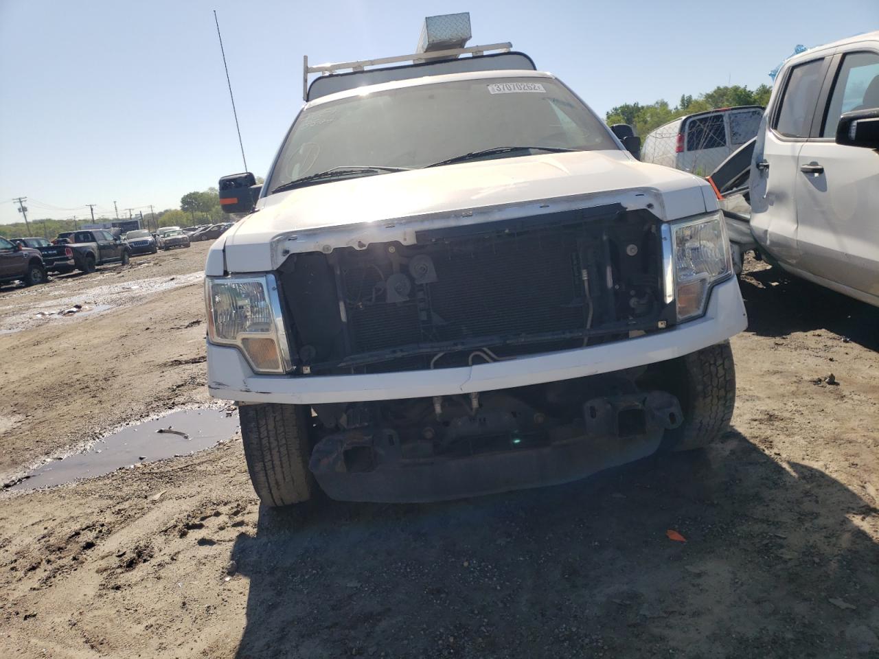 Photo 9 from auction – 2014 FORD F150 with VIN 1FTNF1CF7EKD64163