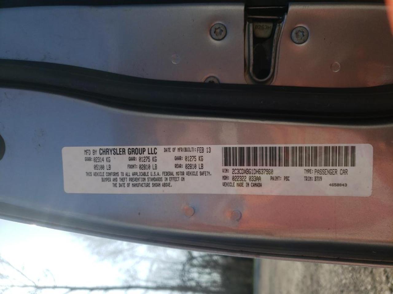 Photo 10 from auction – 2013 DODGE CHARGER SE with VIN 2C3CDXBG1DH637960