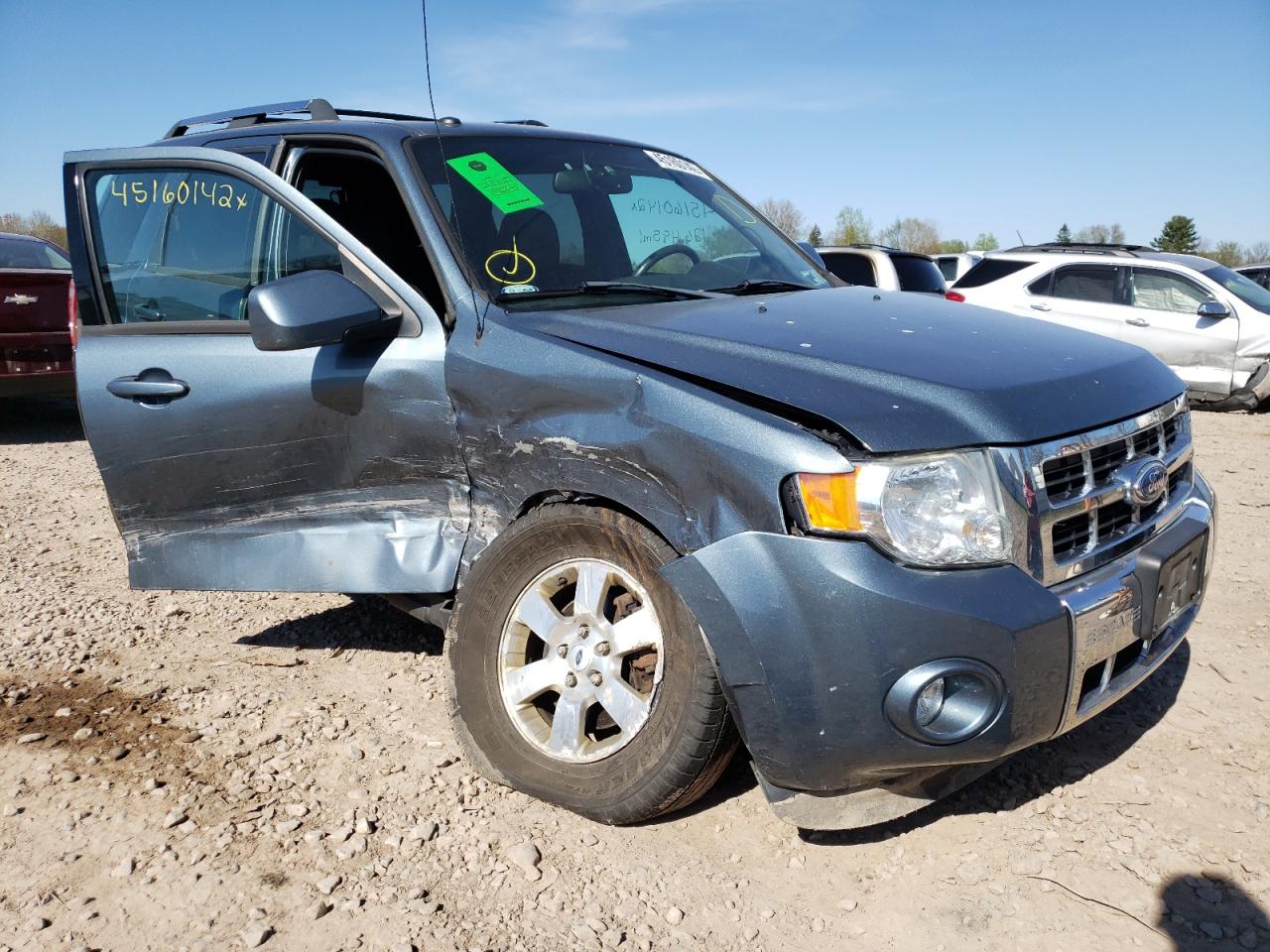 FORD ESCAPE LIM 2012 with VIN 1FMCU9E78CKA70474 - Photo from auction