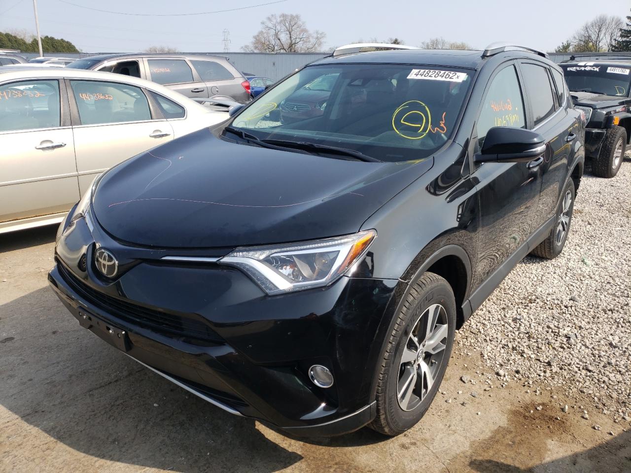 Photo 2 from auction – 2017 TOYOTA RAV4 XLE with VIN 2T3RFREV4HW561274