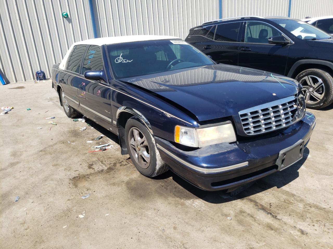 CADILLAC DEVILLE 1999 with VIN 1G6KD54YXXU758203 - Photo from auction
