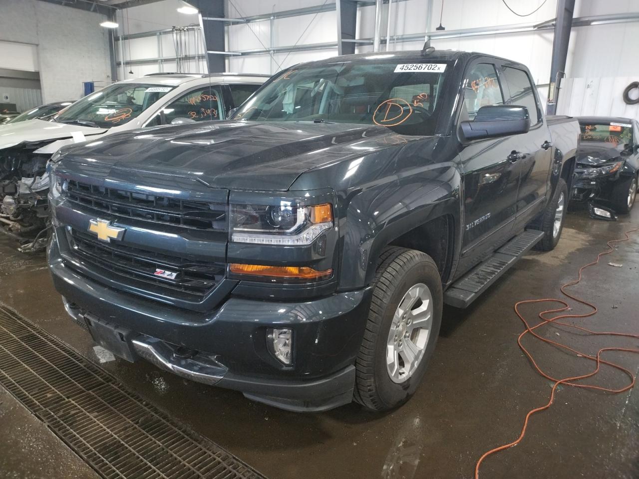 Photo 2 from auction – 2018 CHEVROLET SILVERADO with VIN 3GCUKREC9JG546537