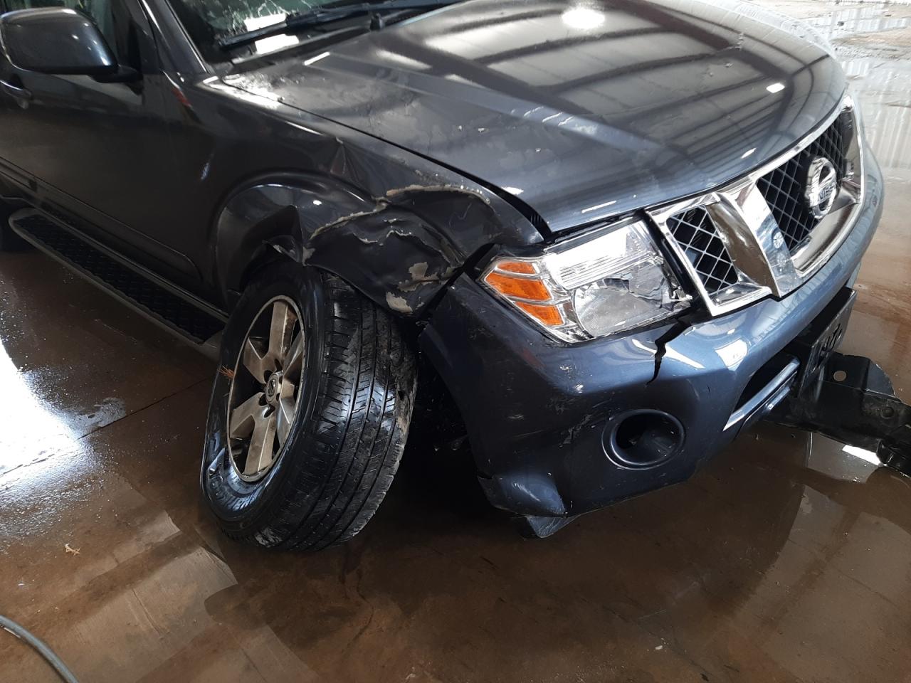 Photo 9 from auction – 2011 NISSAN PATHFINDER with VIN 5N1AR1NB3BC635706