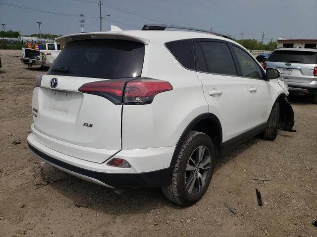 Photo 4 from auction – 2017 TOYOTA RAV4 XLE with VIN JTMWFREV1HD094606