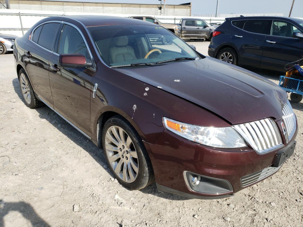 LINCOLN MKS 2009 with VIN 1LNHM94R49G635033 - Photo from auction