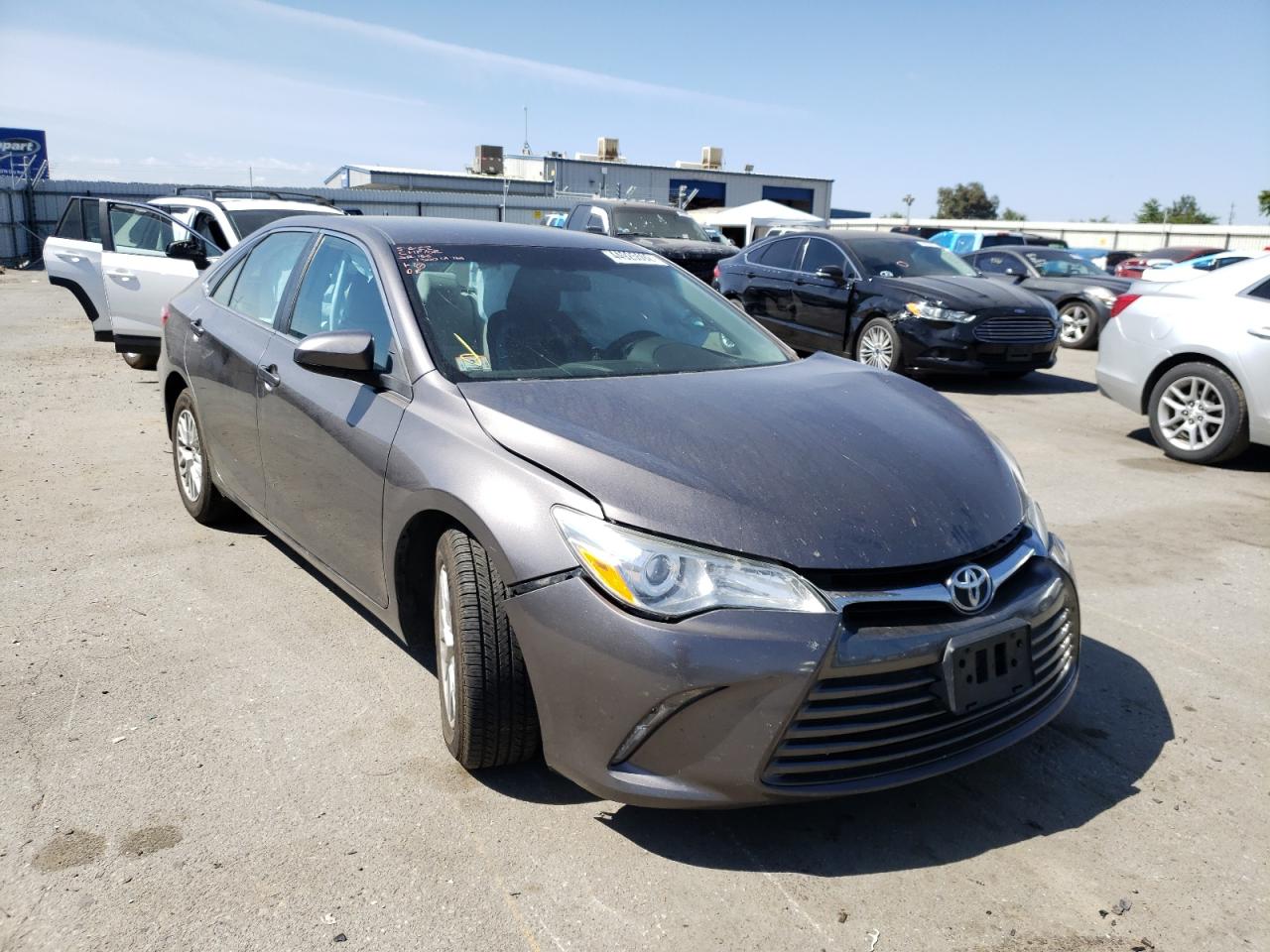 TOYOTA CAMRY LE 2016 with VIN 4T1BF1FK6GU261069 - Photo from auction