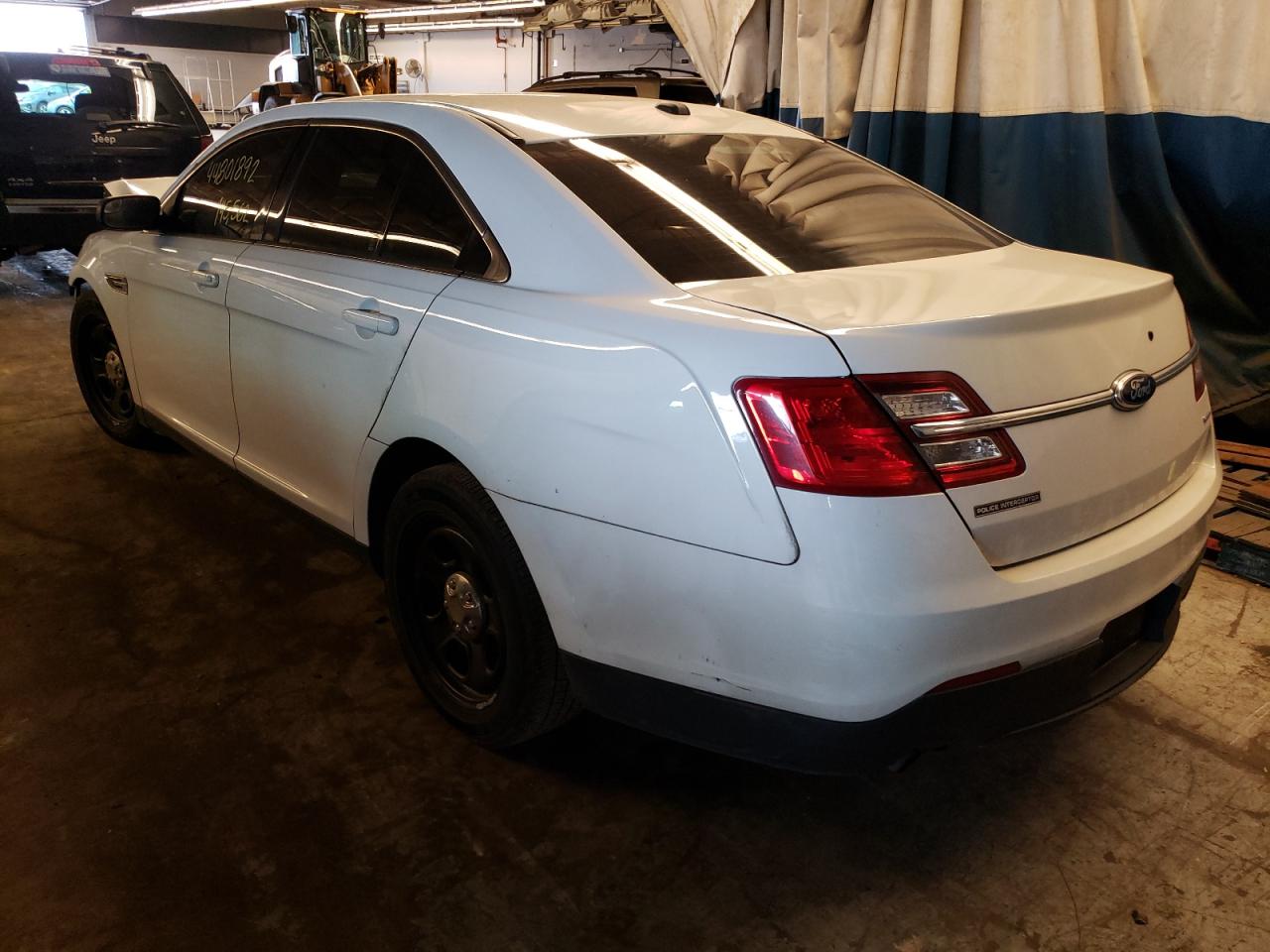 Photo 3 from auction – 2015 FORD TAURUS POL with VIN 1FAHP2MT6FG109339