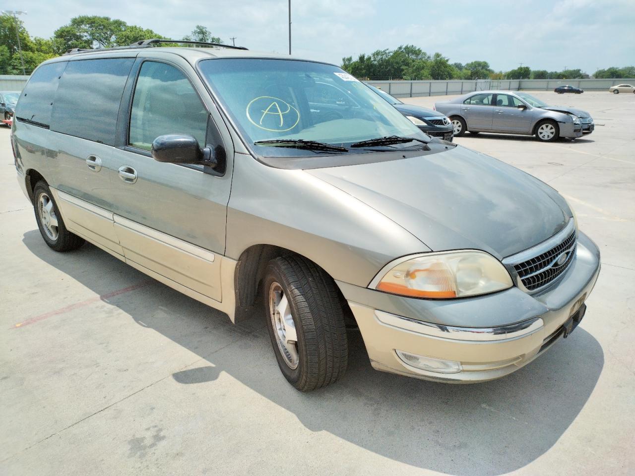 FORD WINDSTAR 2000 with VIN 2FMDA5344YBA72352 - Photo from auction