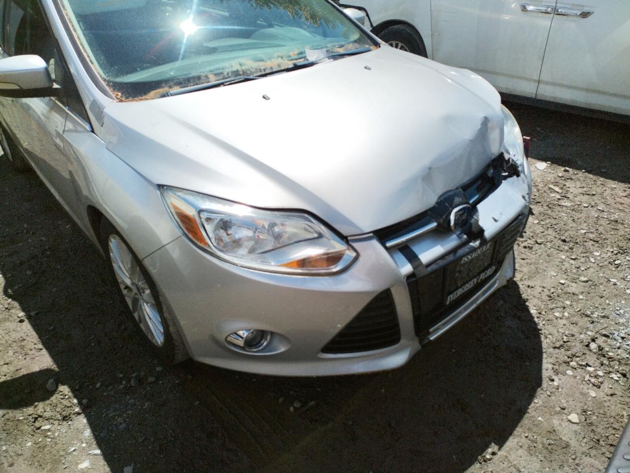 Photo 9 from auction – 2012 FORD FOCUS SEL with VIN 1FAHP3M28CL237632