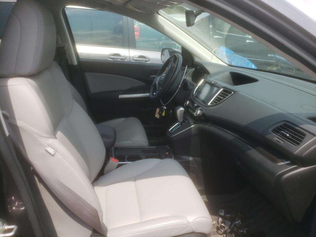 Photo 5 from auction – 2015 HONDA CR-V EXL with VIN 5J6RM4H74FL040572