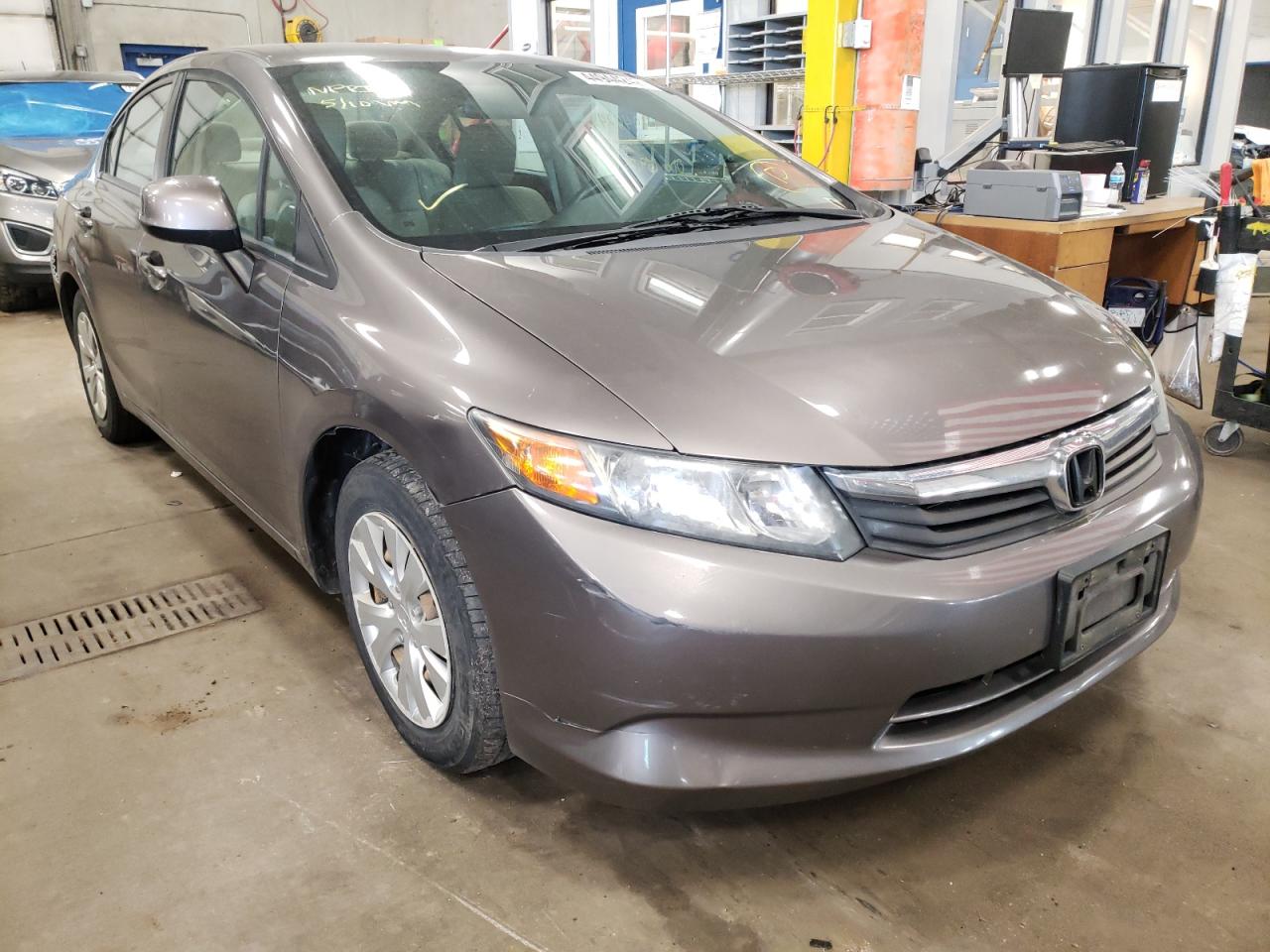 HONDA CIVIC LX 2012 with VIN 19XFB2F58CE106520 - Photo from auction