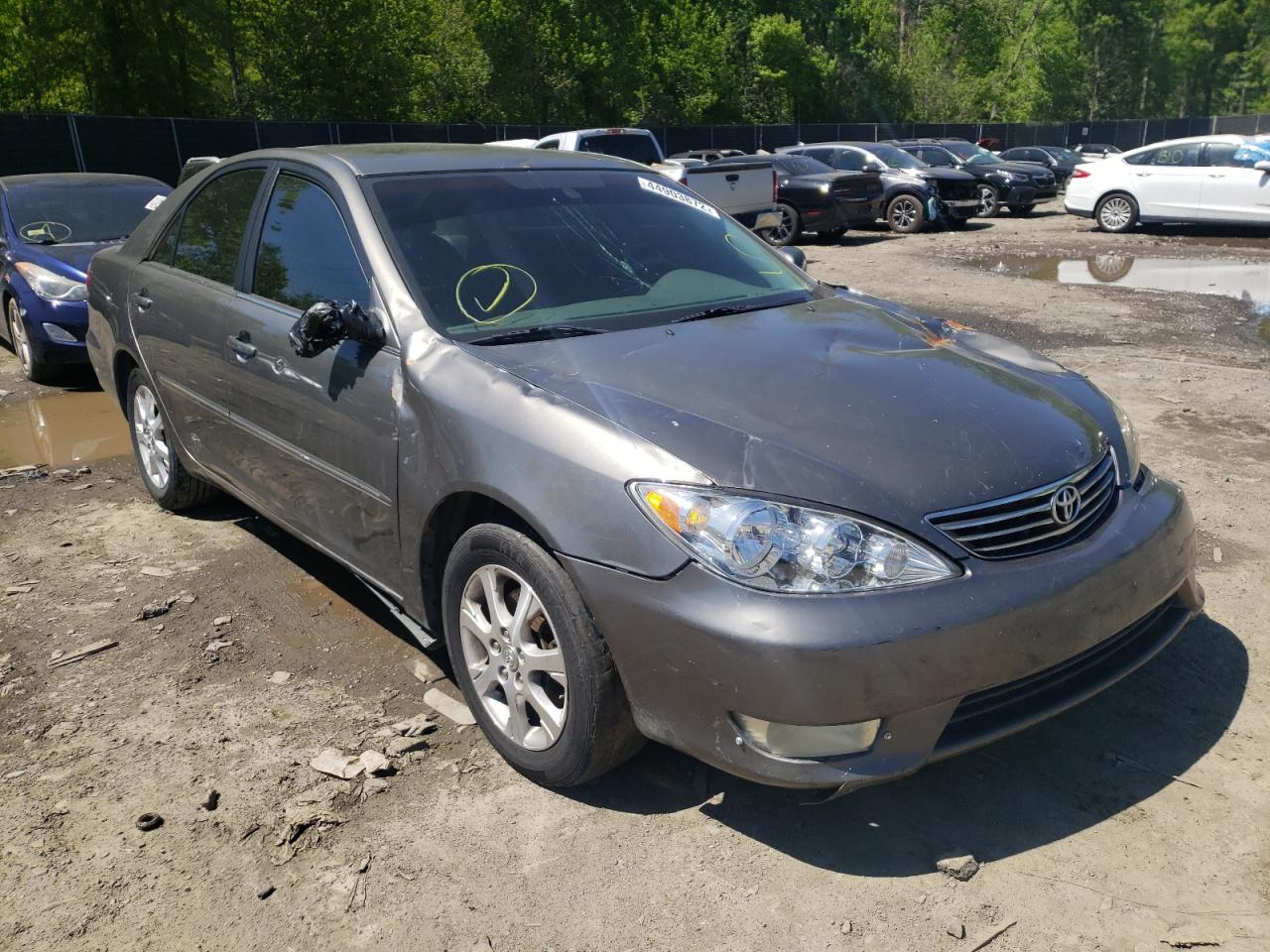 TOYOTA CAMRY LE 2005 with VIN 4T1BF30K25U603845 - Photo from auction