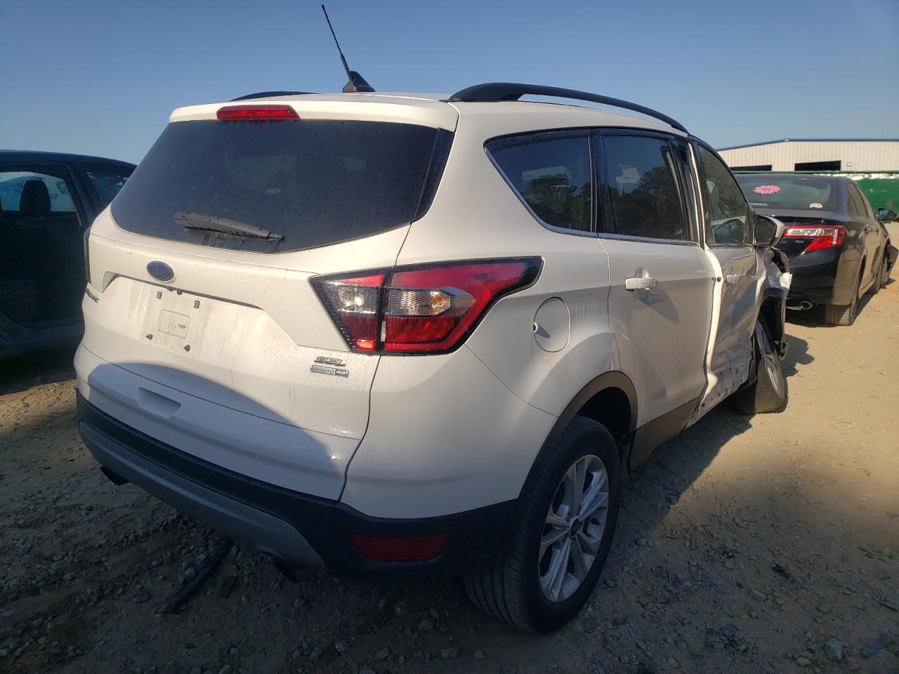 Photo 4 from auction – 2018 FORD ESCAPE SEL with VIN 1FMCU9HD9JUD30478
