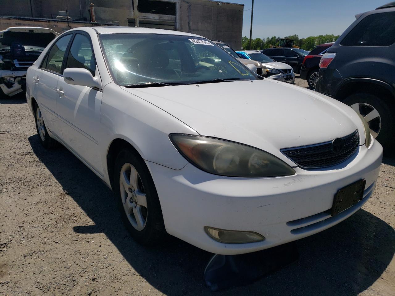 TOYOTA CAMRY LE 2002 with VIN 4T1BF32K12U024743 - Photo from auction
