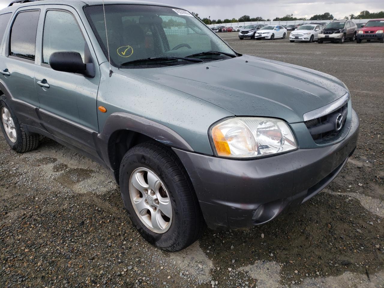 Photo 9 from auction – 2004 MAZDA TRIBUTE LX with VIN 4F2YZ94184KM18347