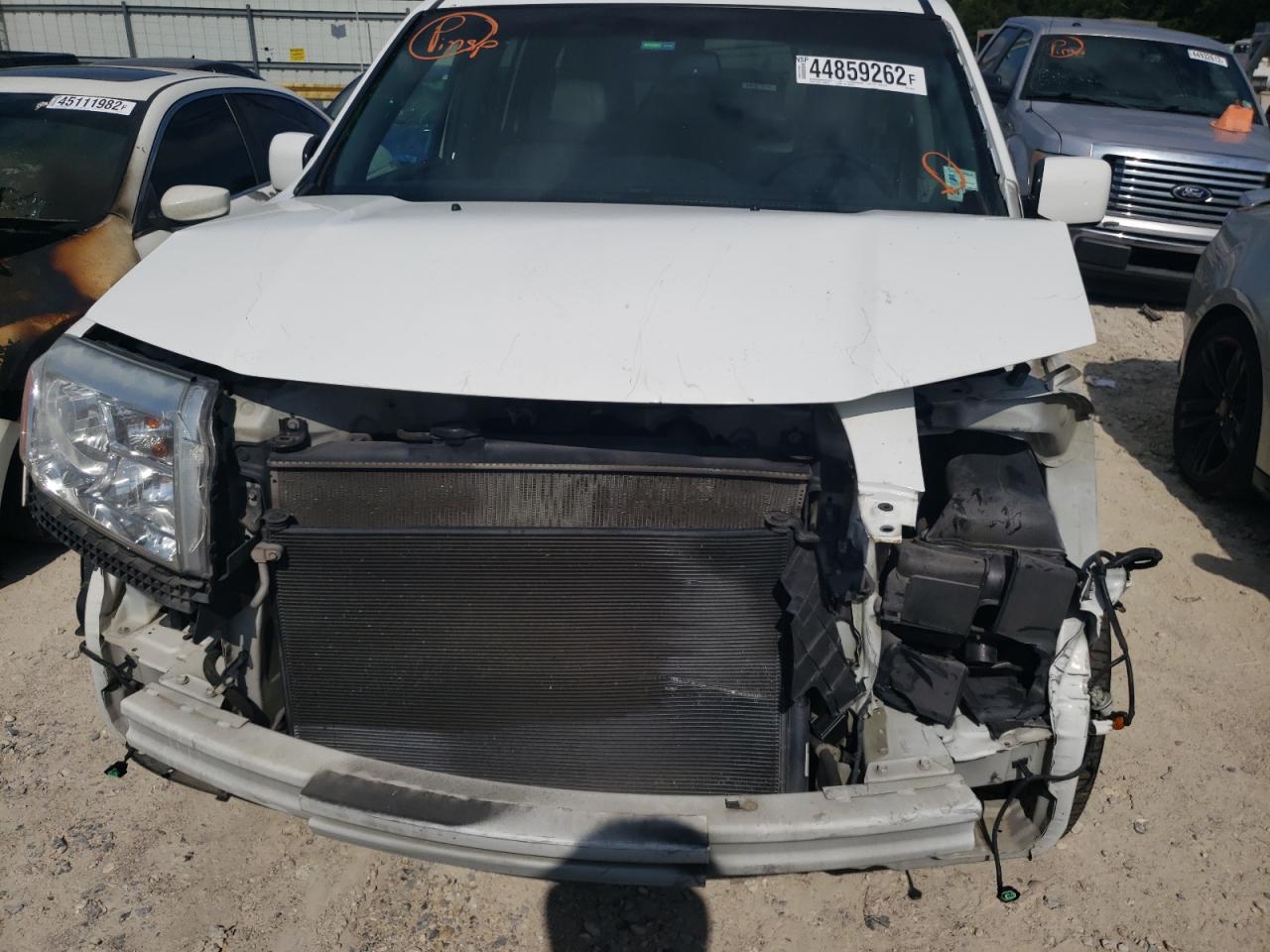 Фото 9 с аукциона – 2012 HONDA PILOT EXL с VIN 5FNYF3H60CB039057