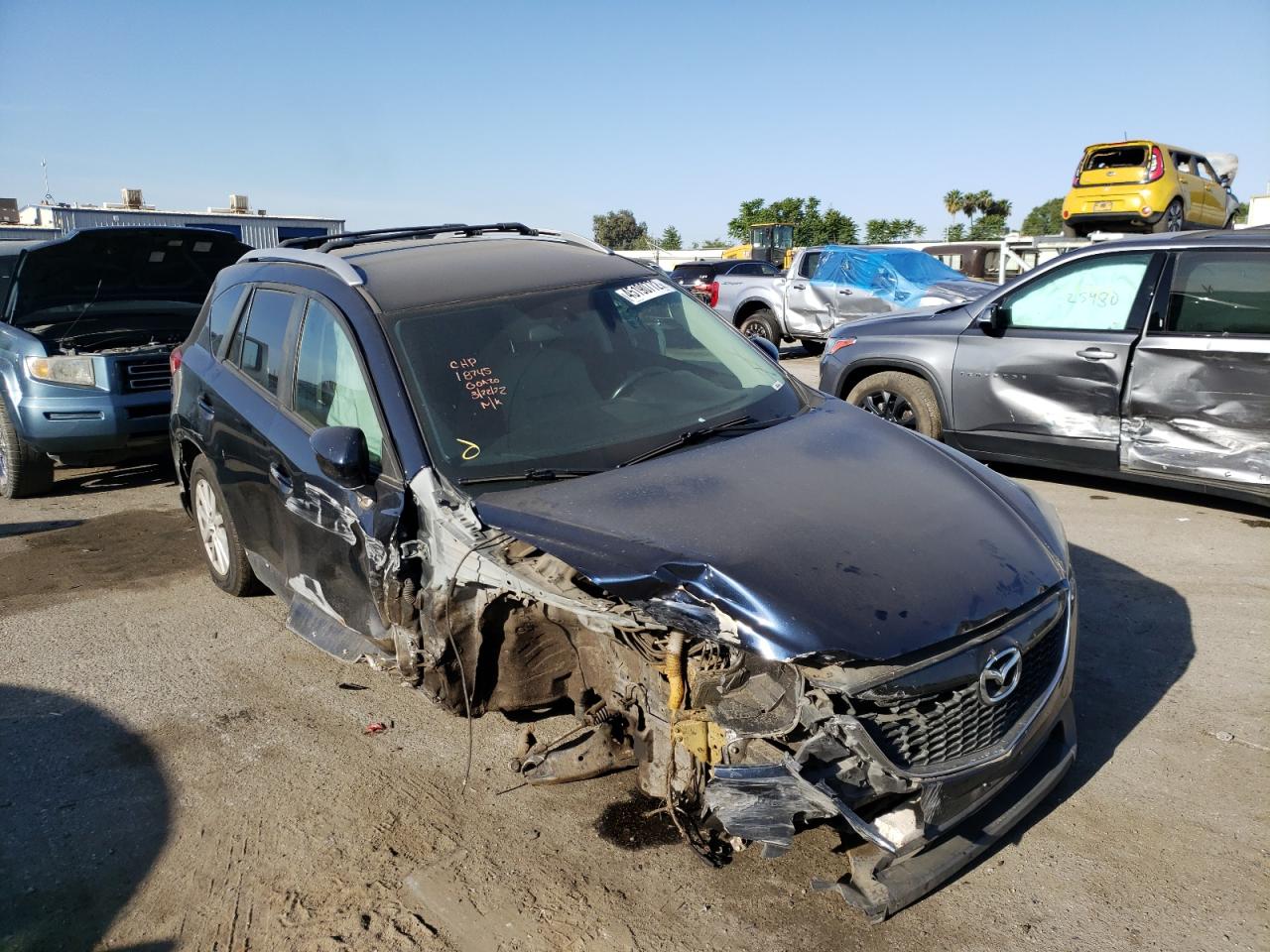 Photo 9 from auction – 2015 MAZDA CX-5 TOURI with VIN JM3KE2CY8F0531020