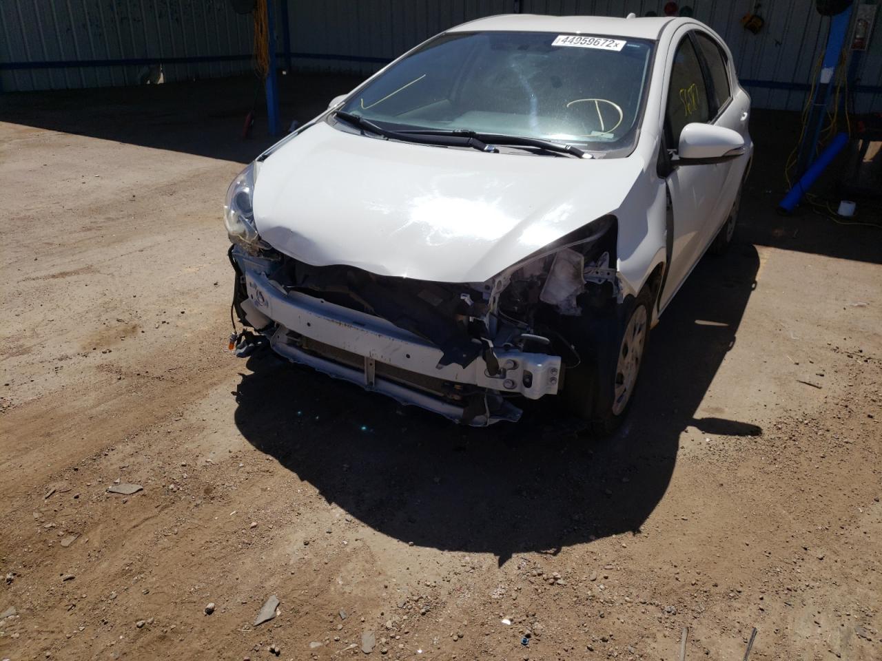Photo 9 from auction – 2016 TOYOTA PRIUS C with VIN JTDKDTB3XG1116705